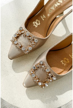 Złote czółenka Jovinea